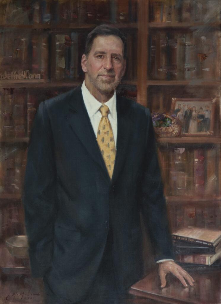 private portrait man with yellow tie in library office